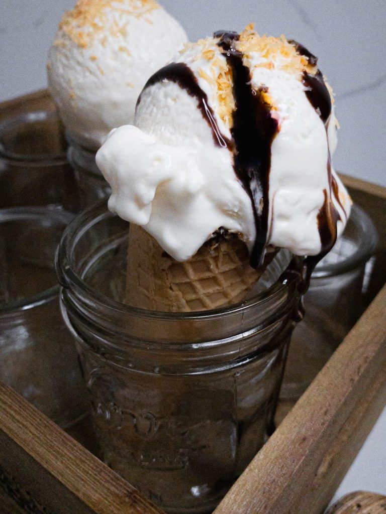 Coconut ice cream with chocolate drizzle
