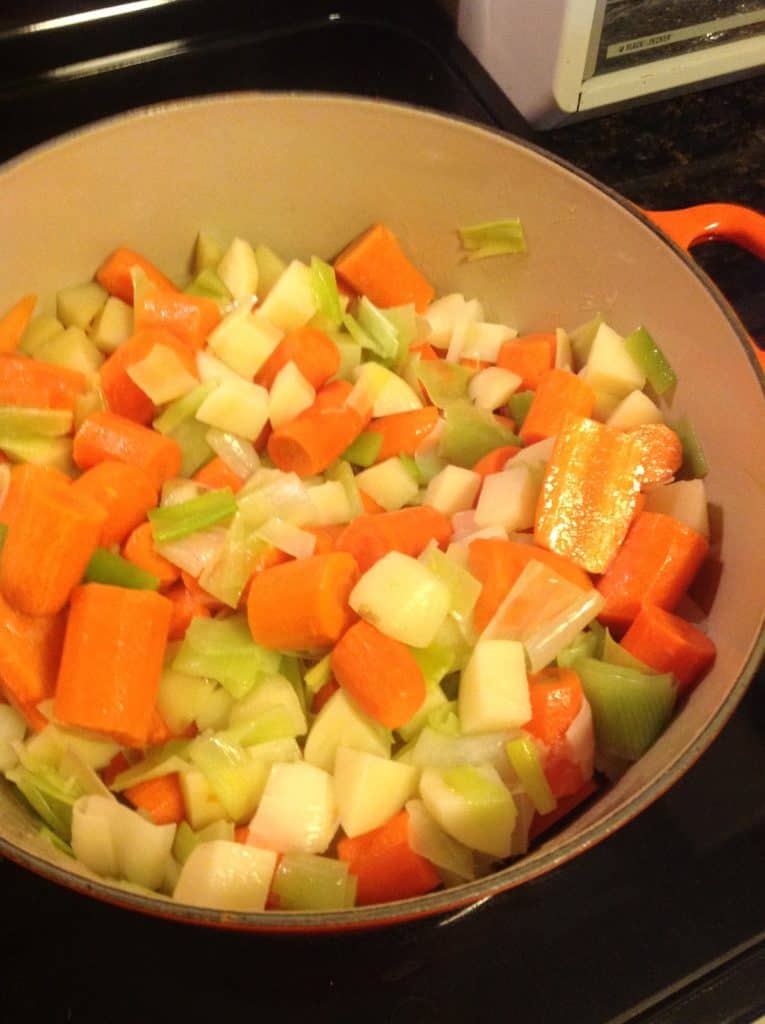Sautéing vegetables for carrot soup