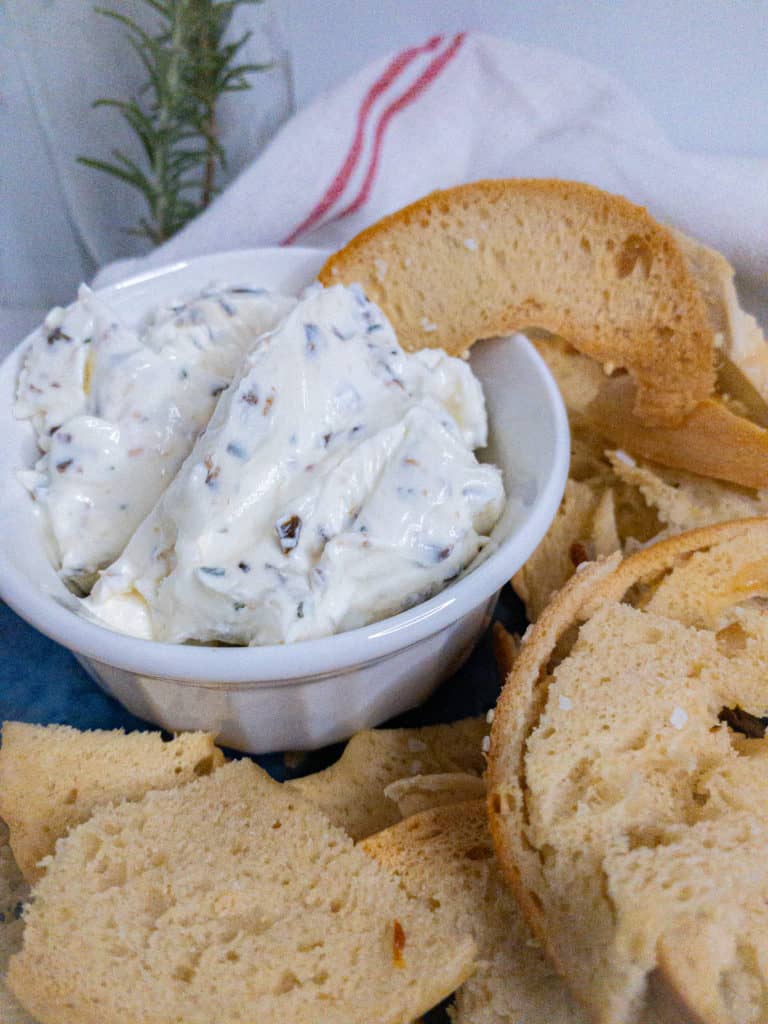 Olive and rosemary cream cheese spread closeup