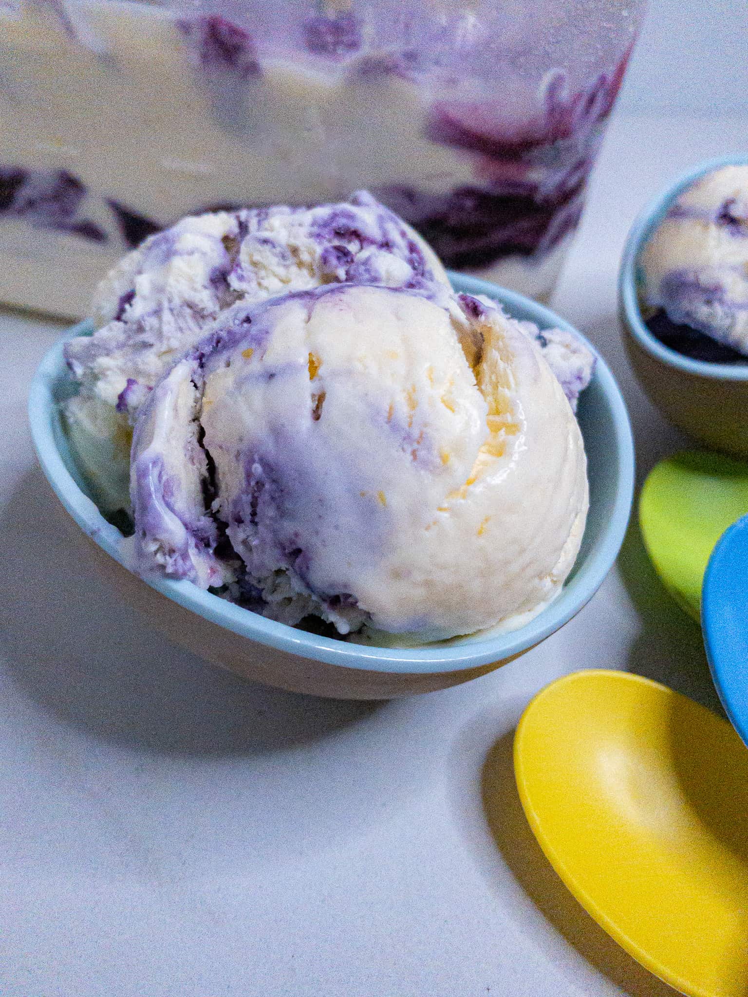 No-churn lemon ice cream with blueberry swirl - single scoop