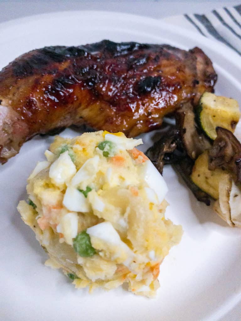 Mom Kaiura's Potato Salad on a dinner plate with Huli Huli chicken and grilled vegetables