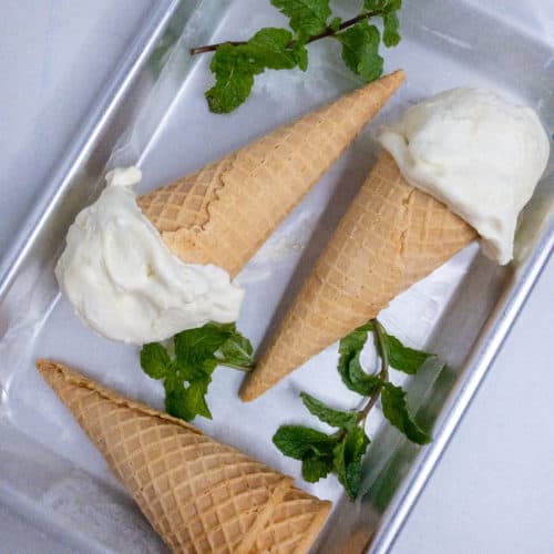 No-churn fresh mint ice cream cones on a tray