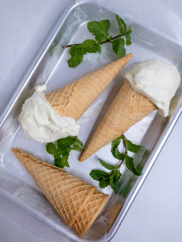 No-churn fresh mint ice cream cones on a tray