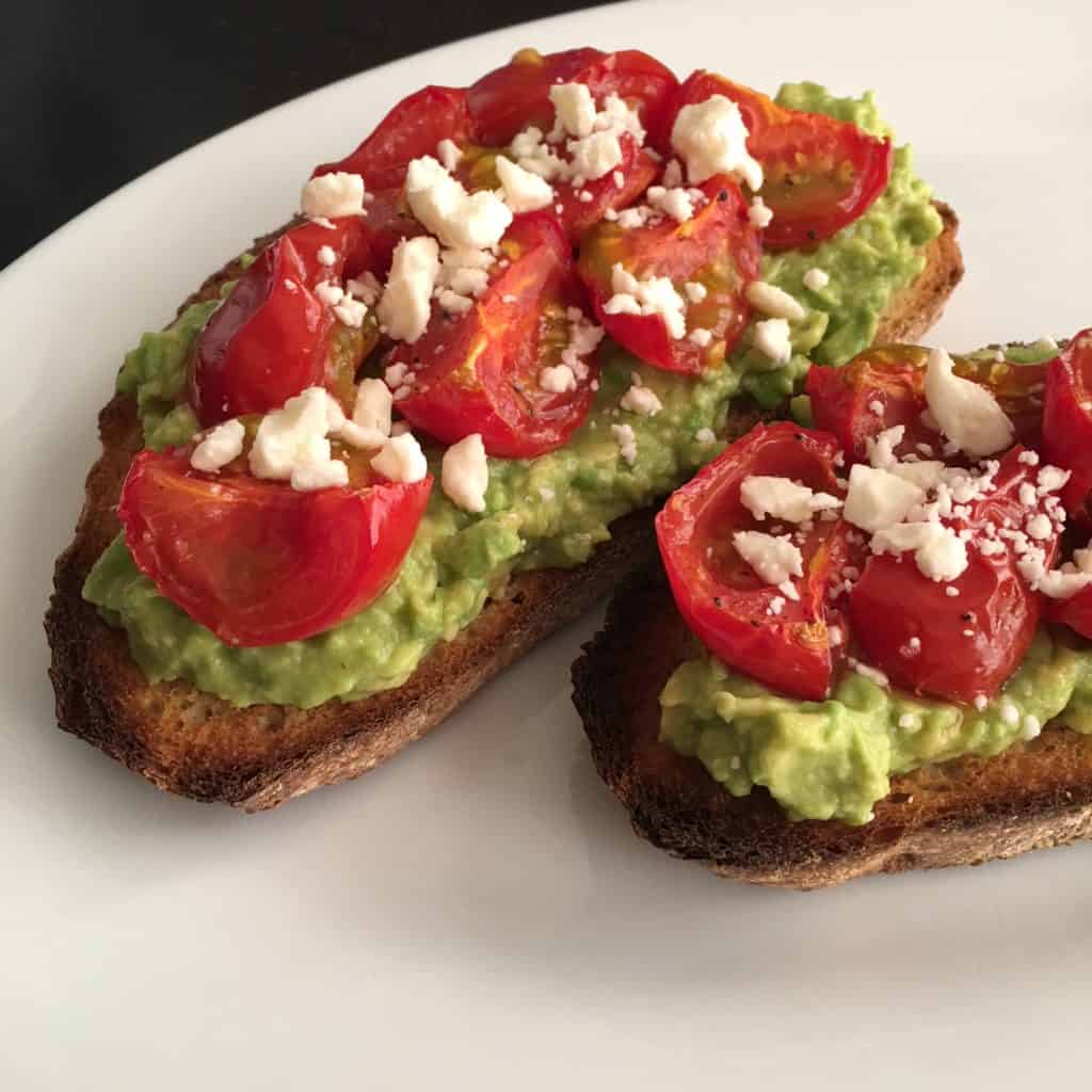 Avocado toast with tomatoes and cheese