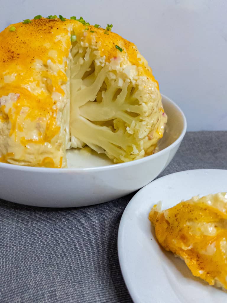 Cheesy Whole Steamed Cauliflower with one serving