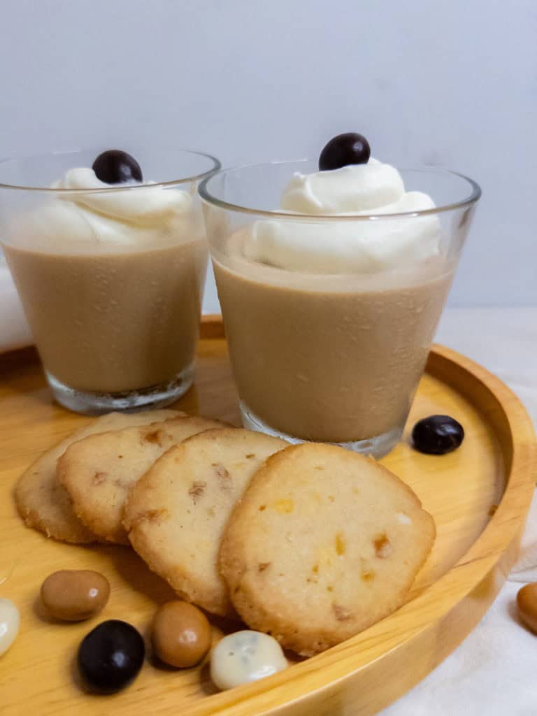 Coffee Panna Cotta with cookies and espresso beans