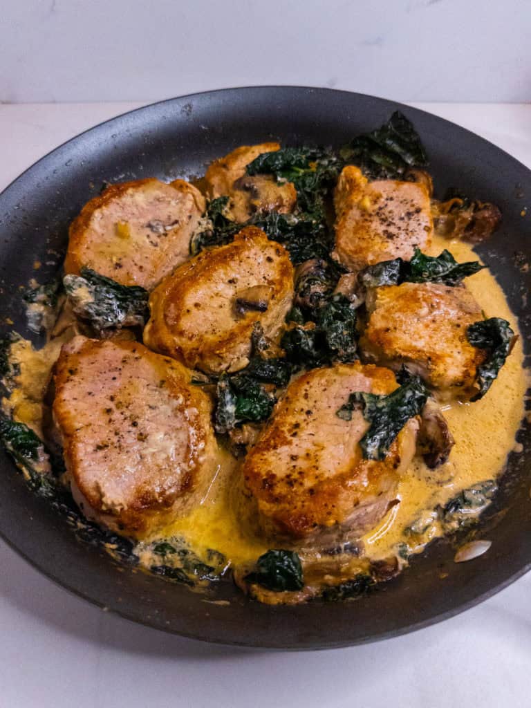 Pork Chops in Creamy Kale Mushroom Sauce - in pan